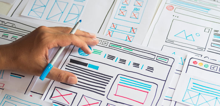 magic marker sketches of website layouts